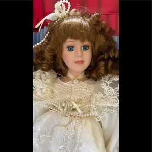 Hand painted porcelain doll